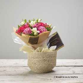 A Rustic Raspberry Basket with Chocolates